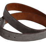 A brown buffalo leather belt with a silver buckle, showcasing a textured, natural leather finish.