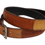 A unisex ostrich leather belt with an overlap design, displaying a rich texture and a sleek buckle.