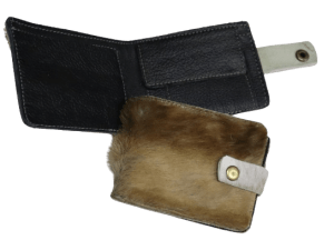 A sleek springbok leather wallet, showcasing a unique textured finish and a compact design.