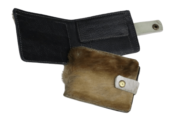 A sleek springbok leather wallet, showcasing a unique textured finish and a compact design.